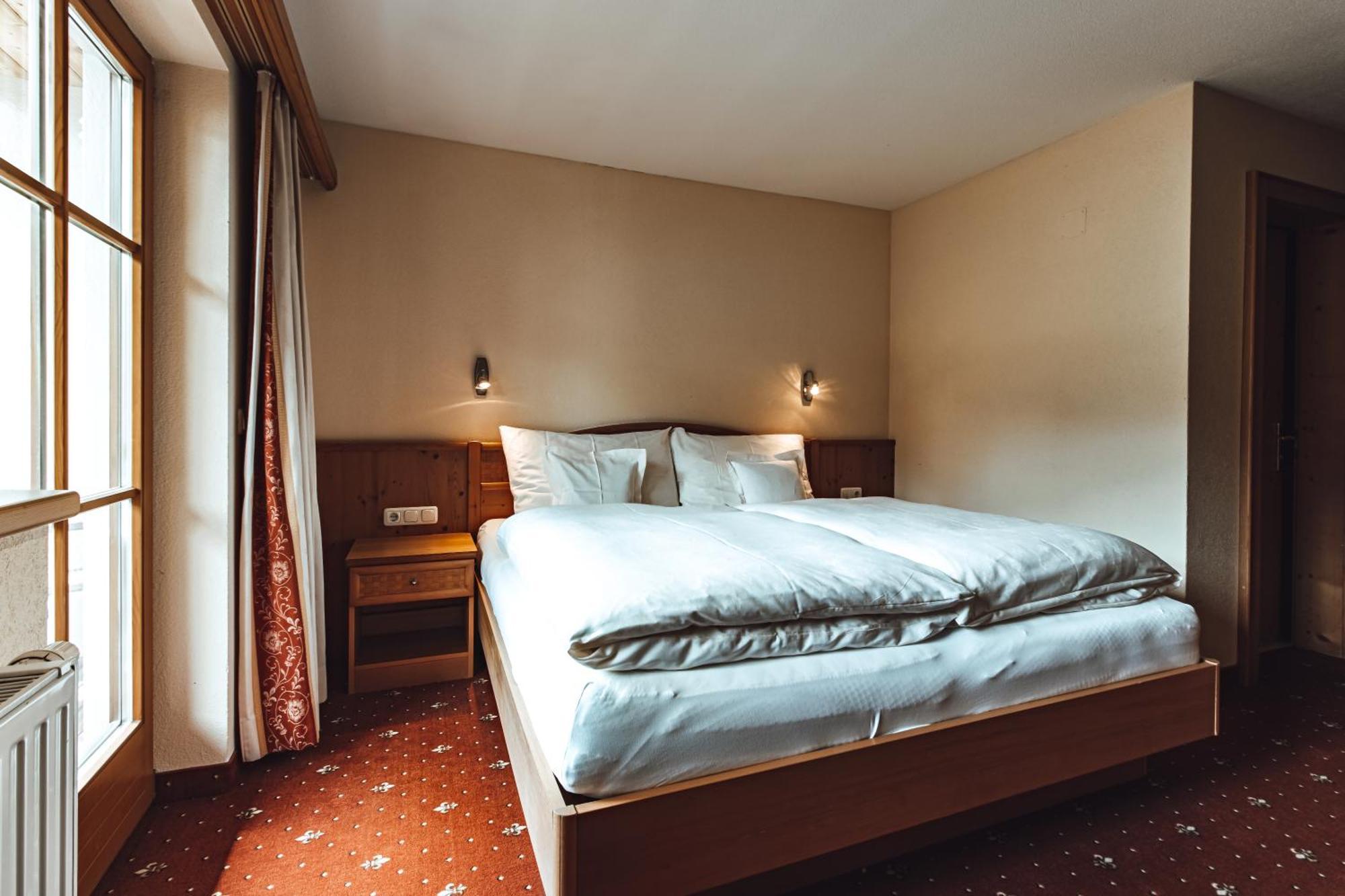 Hotel Chalets Grosslehen Fieberbrunn Pokoj fotografie